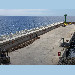 GNSS antenna (left) and tide gauge sensor (right)