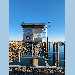 GNSS antenna and tide gauge shelter